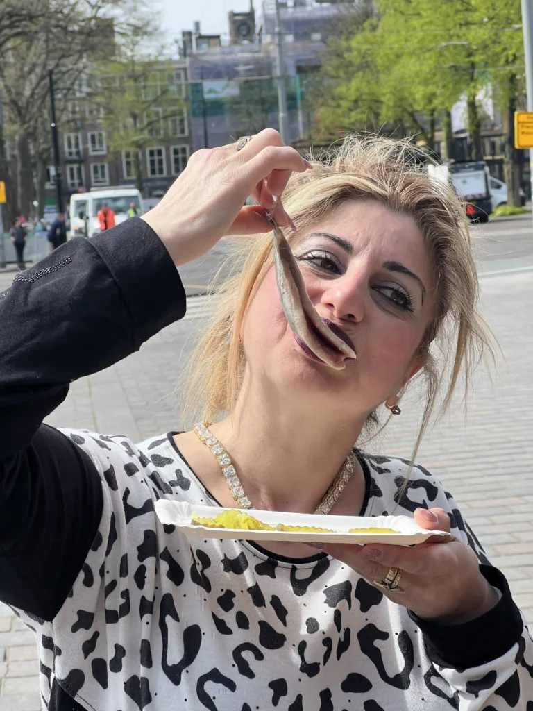 Traditional Dutch herring during a food tour in Amsterdam